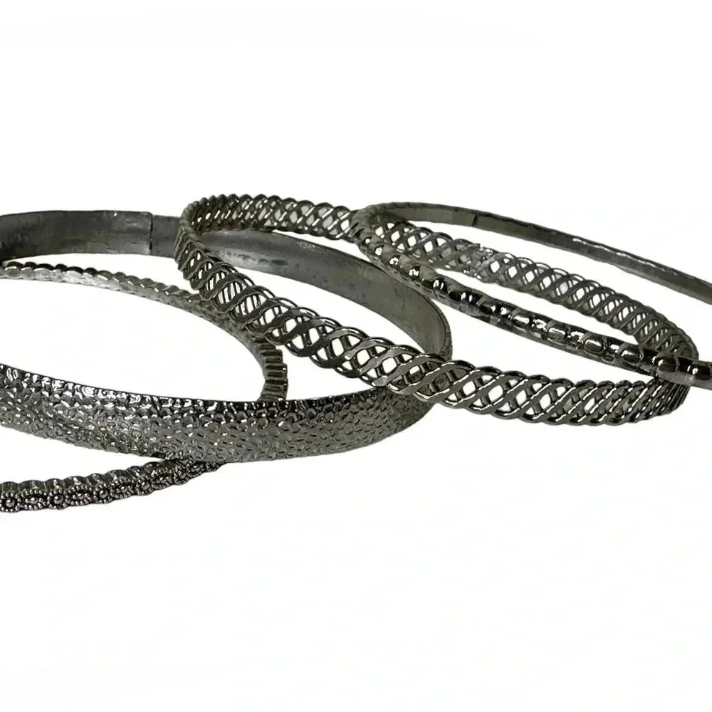 Set of 4 silver bangle bracelets
